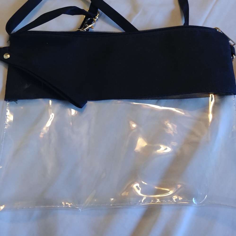 Clear crossbody or wristlet approximately 8.5 x 11